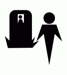 Man In White Standing By The Grave